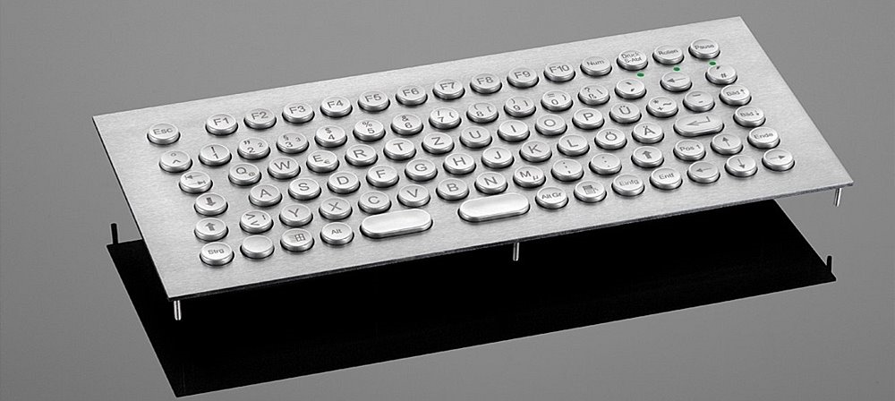 Tastiera antivandalo in acciaio inox 86T-ES con trackball e disponibile in versione da tavolo. Disponibile in tutte le varianti di layout. 